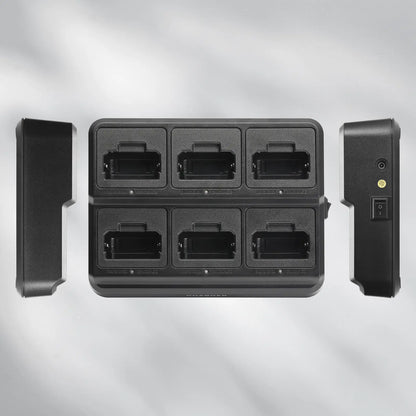 Black electronic device with multiple ports on a gray background