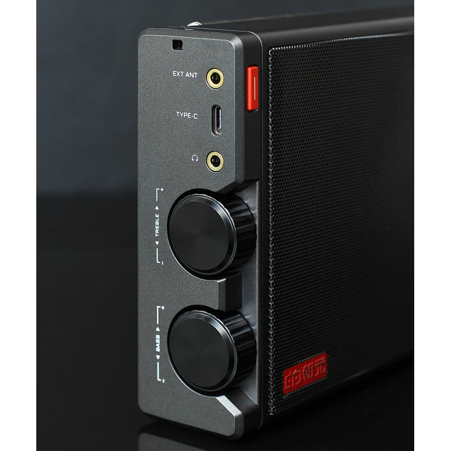 Side view of the black CHOYONG LC100 showing antenna and headphone sockets, USB-C port, and bass and treble knobs