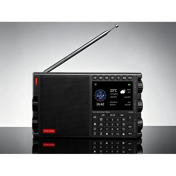 Black CHOYONG LC100 on a tabletop with clock and weather information on its standby display